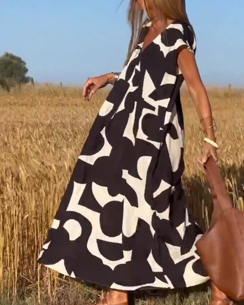 SITA - Robe imprimée avec décolleté en V